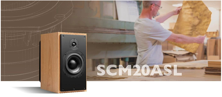 Digital landscape orientation cropped marketing banner featuring the ATC SCM20ASL 2-Way Active Stand-Mount Loudspeaker Cherry Finish product model with a background behind showcasing the man holding a piece of material that went into making this specific product model