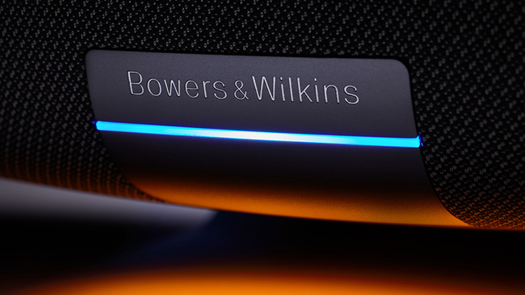 Bowers and Wilkins Zeppelin McLaren Edition wireless speaker Front Logo Panel View with light on