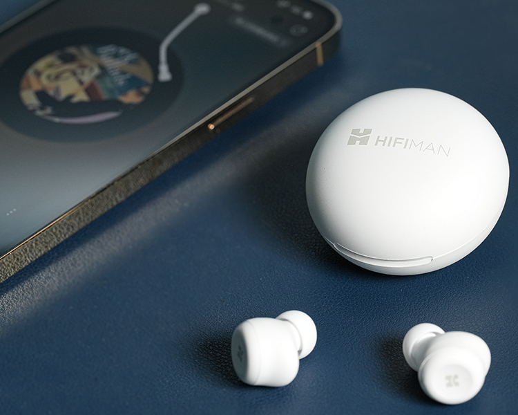HIFIMAN True Wireless TWS450 Earbuds & Carrying Case as product model is sitting nearby a smartphone