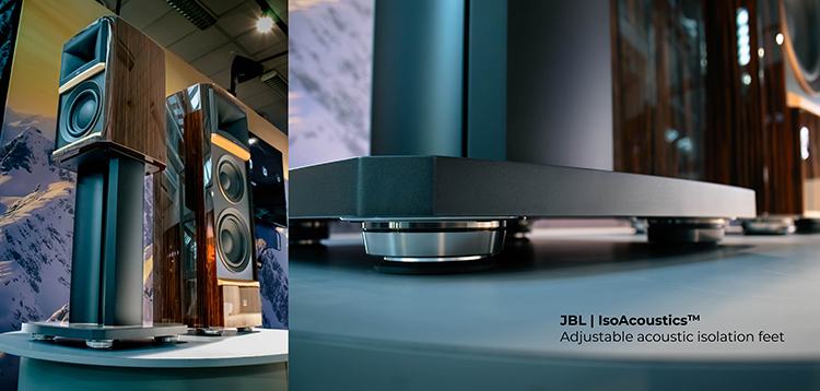 Horizontal orientation promotional marketing banner showcasing the JBL | IsoAcoustics Adjustable acoustic isolation feet featuring floor-standing speaker audio product models