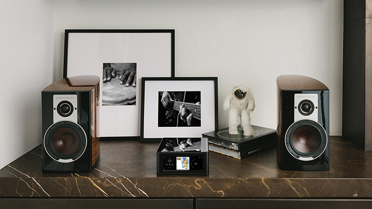 NAD Masters M10 V3 BluOS Streaming Amplifier Front Lifestyle View alongside DALI EPICON 2 Bookshelf Speakers Walnut (High Gloss) Finish