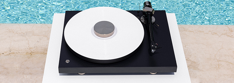 Pro-Ject Debut Pro B Turntable at the ledge of a poolside Top Front Angle View