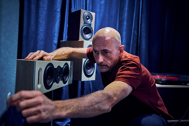 Krestian Pedersen, DALI Head of Product Management, seen adjusting something on one of the DALI loudspeaker models