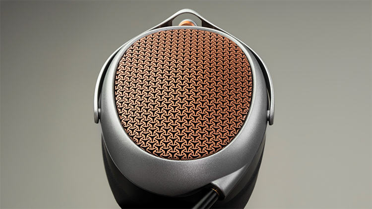 Portrait orientation close-up photograph side top aerial exterior view of the Meze Audio POET planar-magnetic headphone