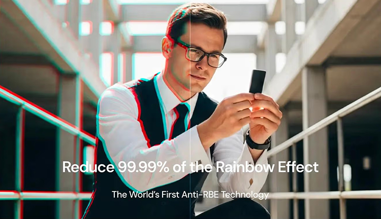 Valerion's Anti-Rainbow Effect Technology digital promotional marketing image showcasing a man holding and looking at a tiny small device of some kind while typography displays underneath reads as the following - Reduce 99.99% of the Rainbow Effect The World's First Anti-RBE Technology