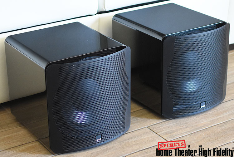Dual SVS SB-3000 subwoofers with grilles on