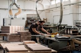 Guy working within De Santi Woodworking Factory