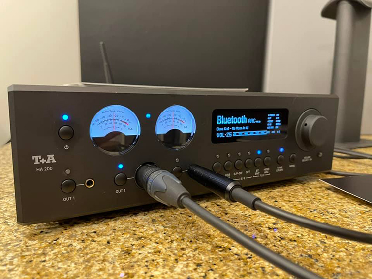Zoomed in view of a product display reveal through German brand T+A at Florida Audio Expo 2022