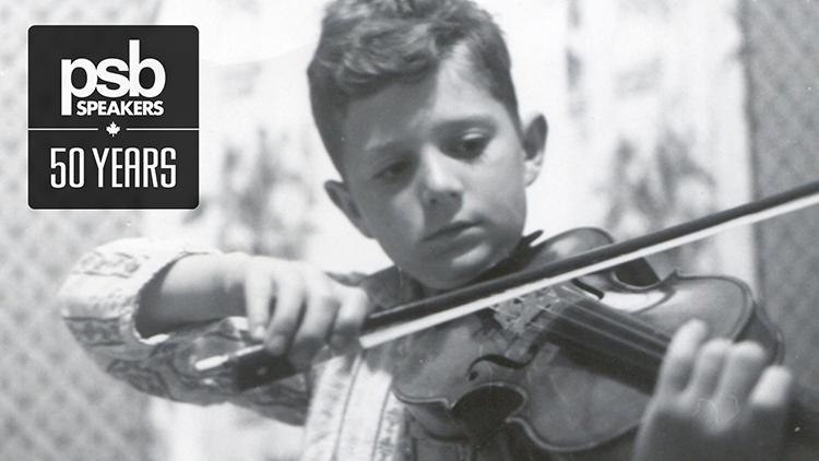 Paul Barton as a child playing the violin