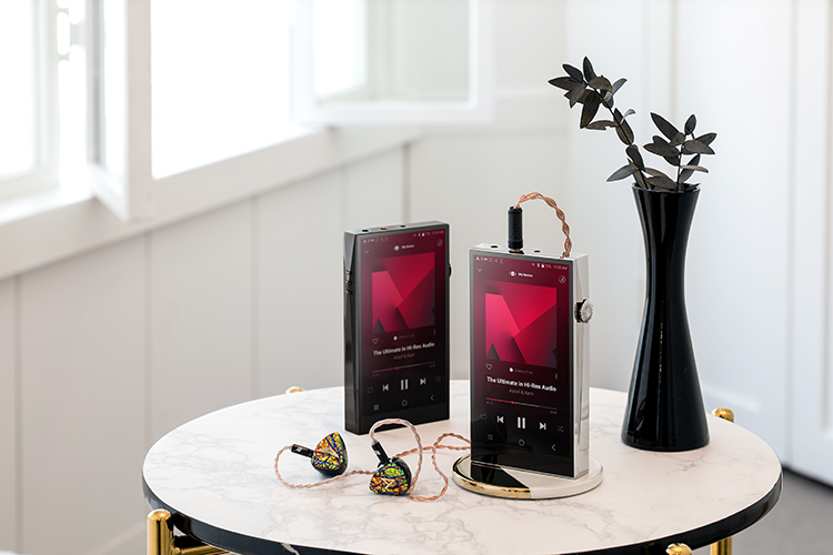 Astell and Kern Aandultima SP3000 Digital Audio Player standing on top of a circular tabletop 